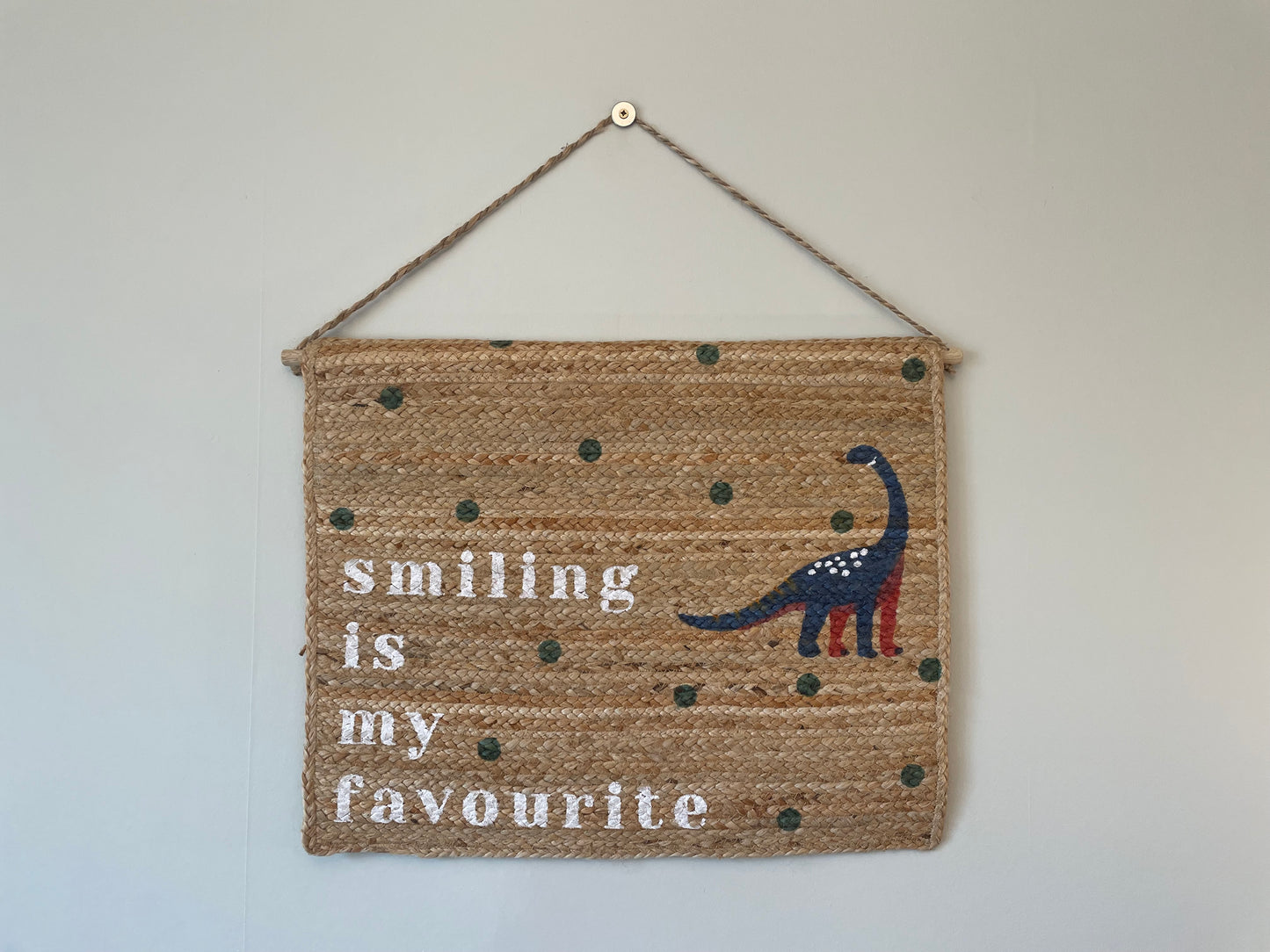 dinosaur jute wall hanging