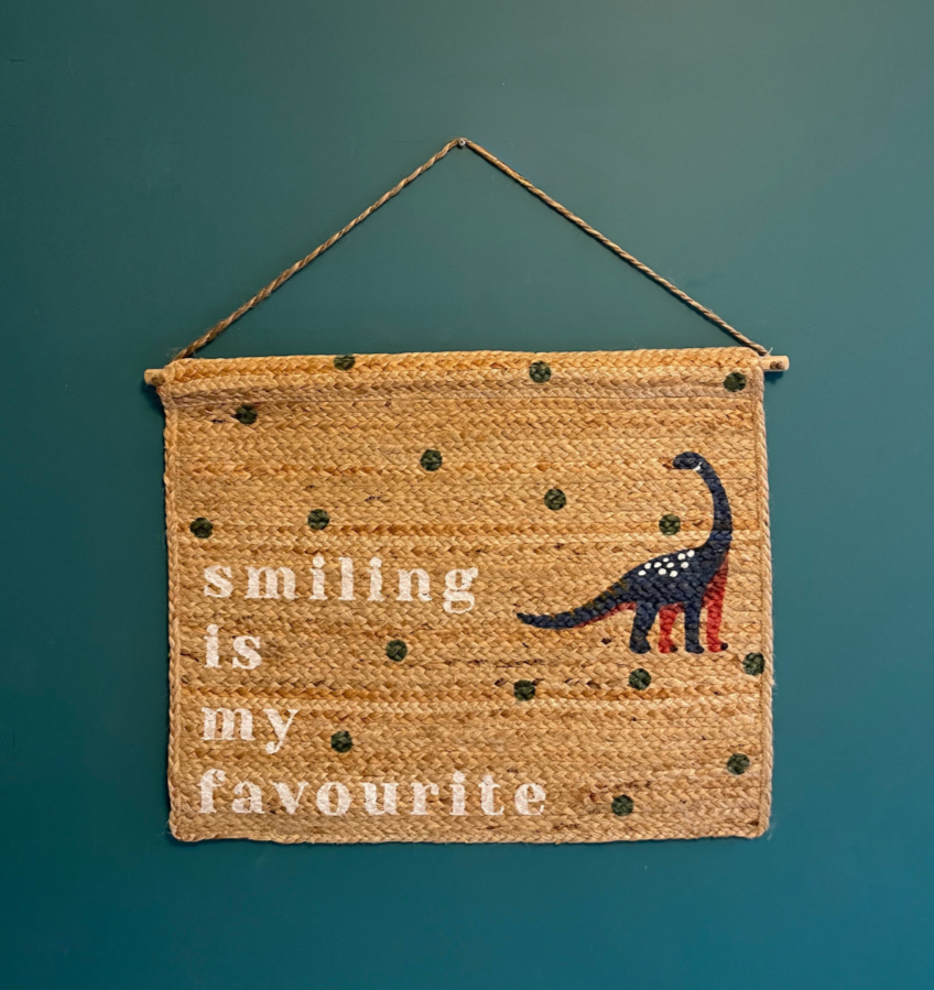 dinosaur jute wall hanging